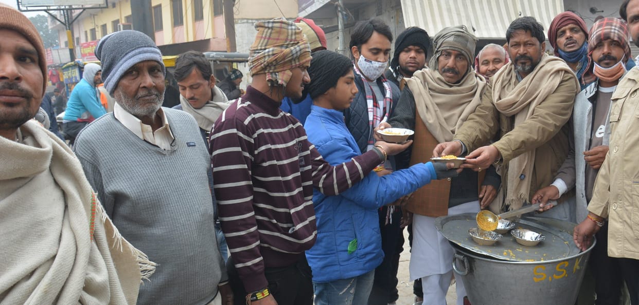 On Makar Sankranti, khichdi's prasad is distributed everywhere in the city.
