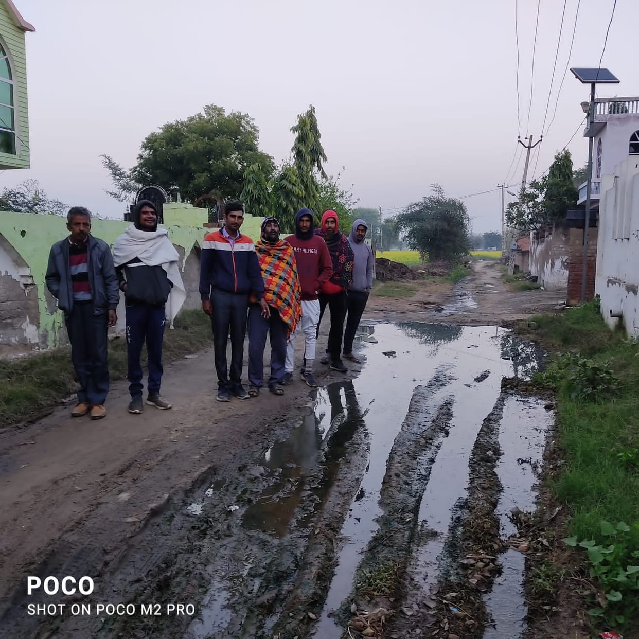 Villagers upset due to mud accumulated in the main road of the village