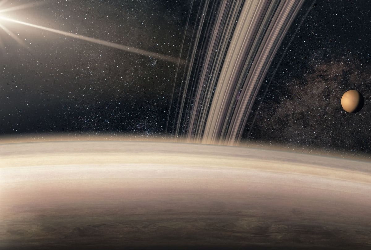 Water on The Moon saturn moon mimas may be hiding a ocean study finds