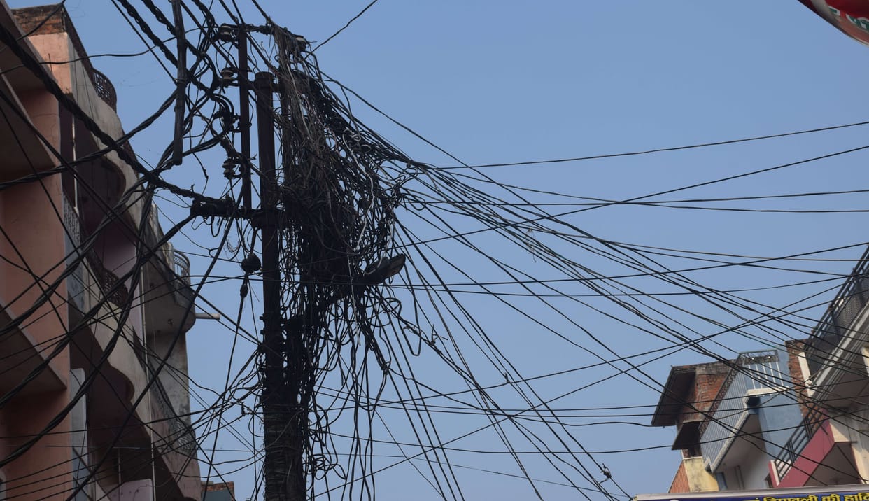 74 crores blown on underground cable but power system entangled in poles