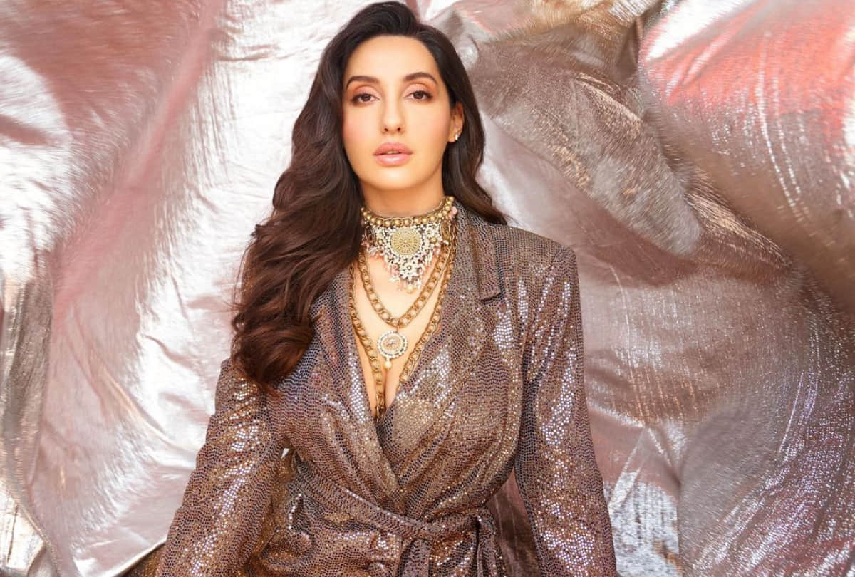 nora fatehi bling in gold pant suit latest photoshoot