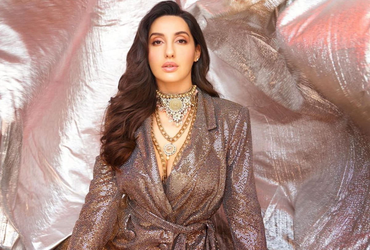 nora fatehi bling in gold pant suit latest photoshoot