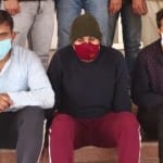 पुलिस की गिरफ्त में आरोपी। 