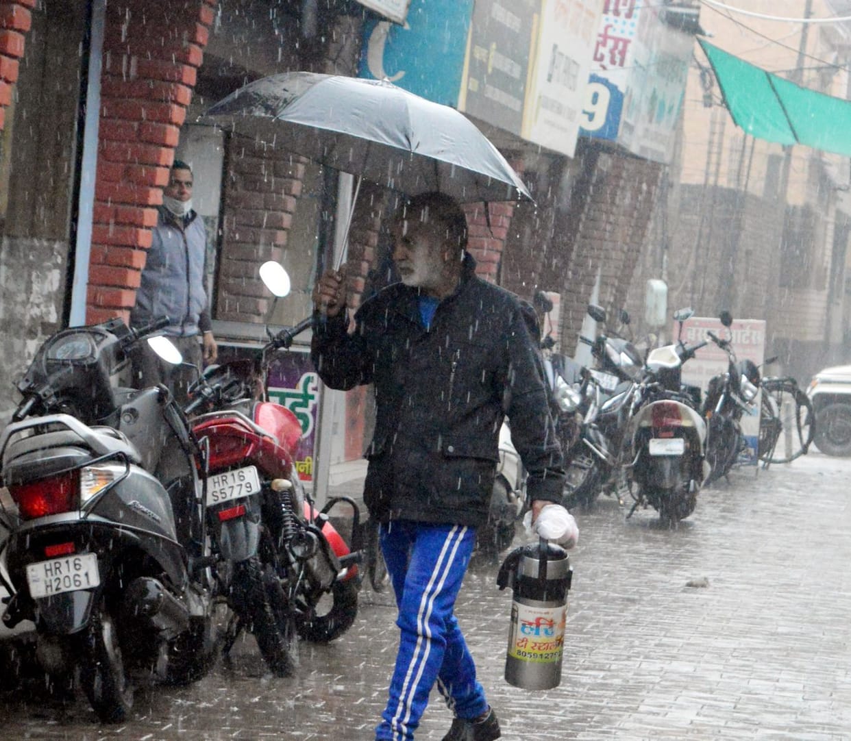 Intermittent light drizzle throughout the day, water filled in low-lying areas