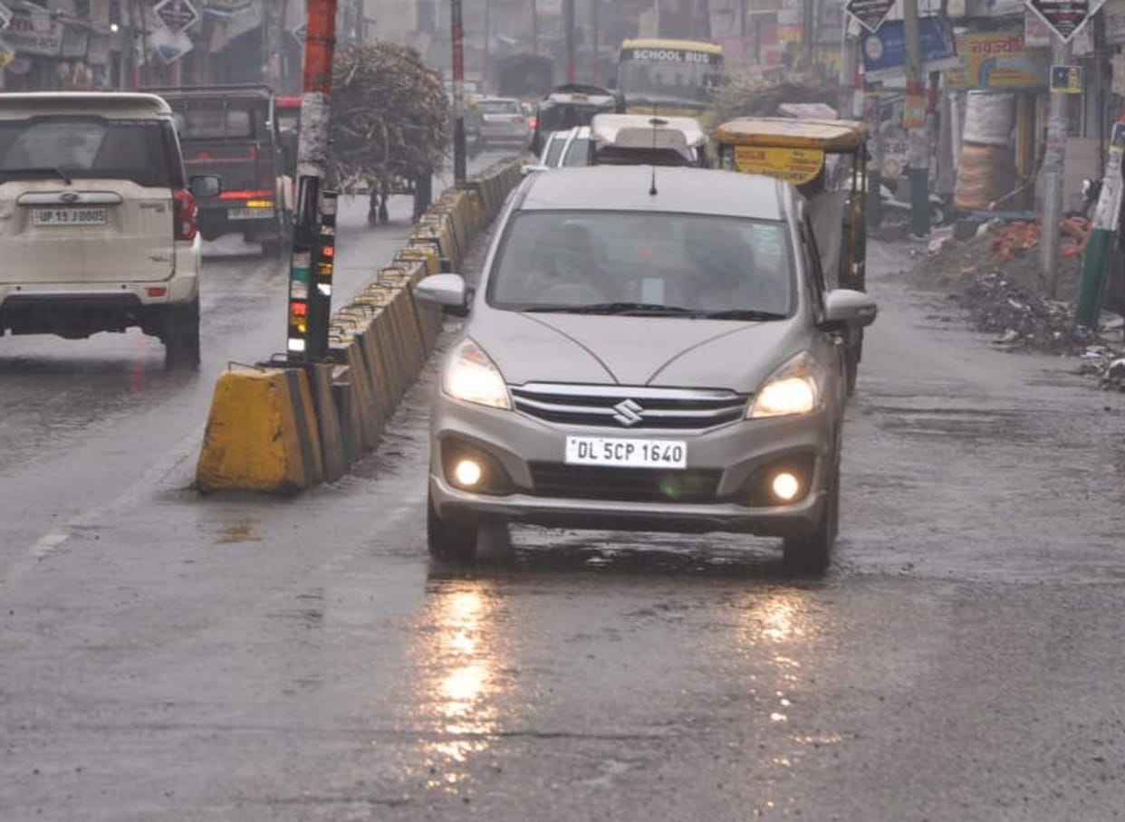 Intermittent drizzle disrupted life throughout the day