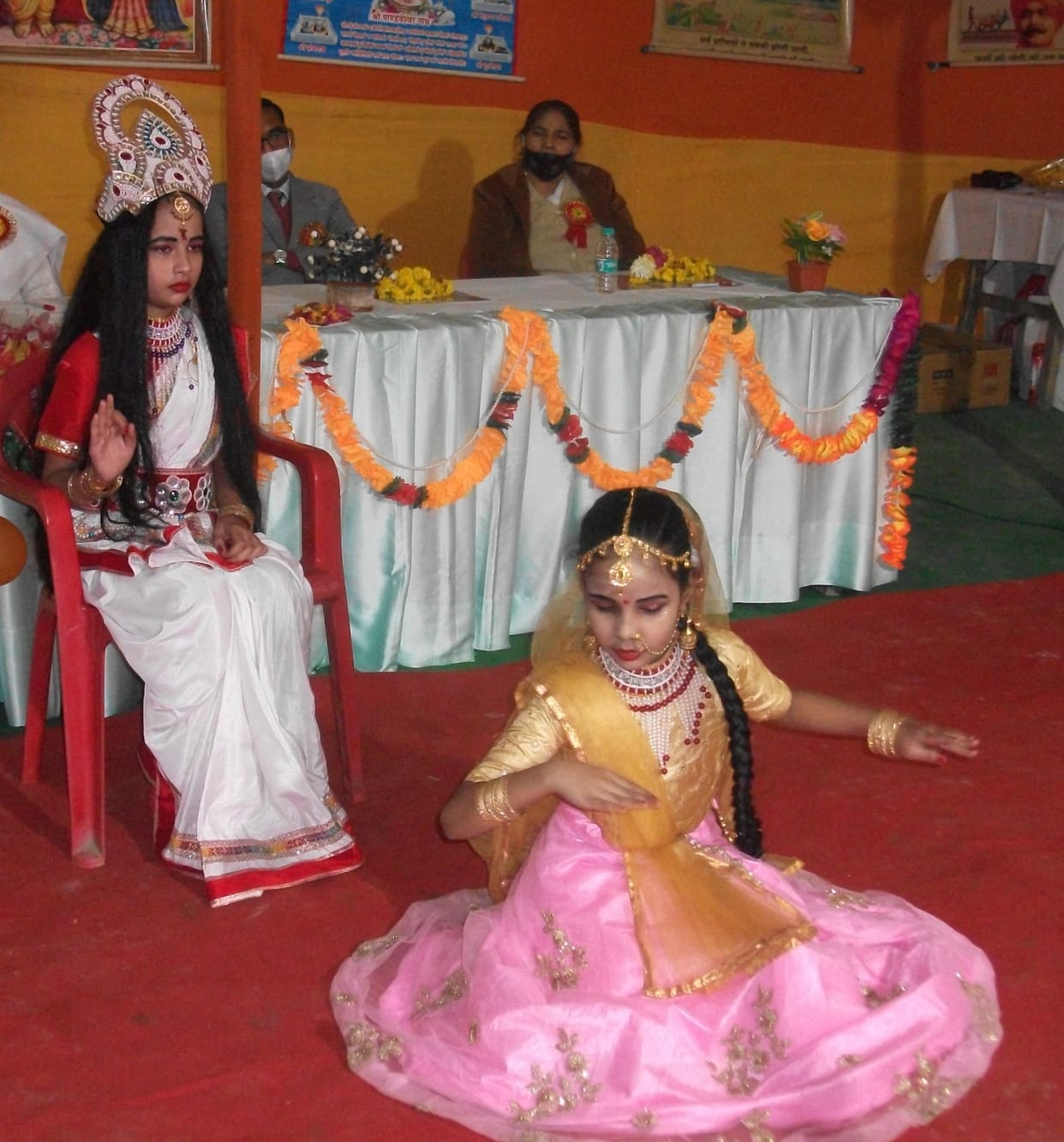Devotees engaged in the work of religion, chanting in huts