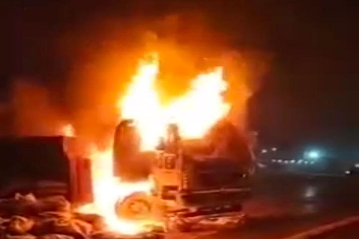 In an attempt to save the car, the truck overturned uncontrollably, caught fire,