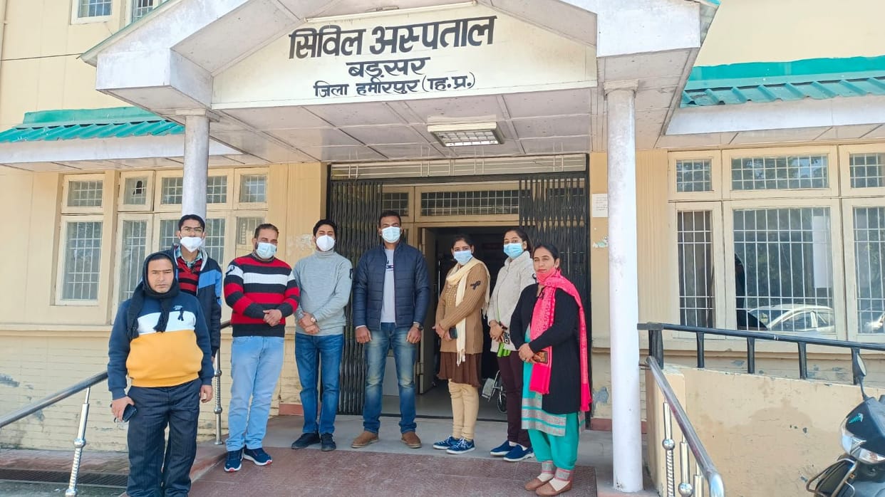 Angry with the government, health committee employees put up black badges