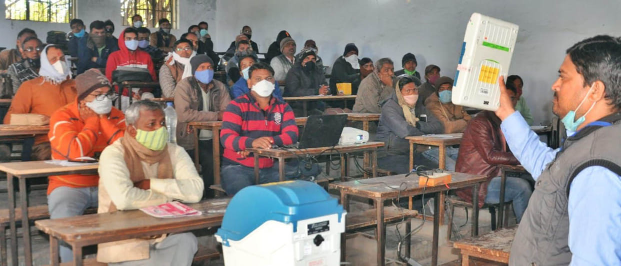 ADM said, get the workers to vote wearing gloves and masks