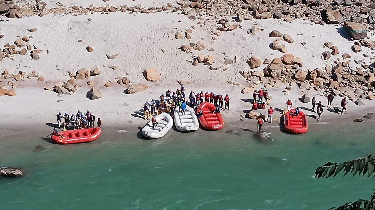 Tourists enjoy rafting