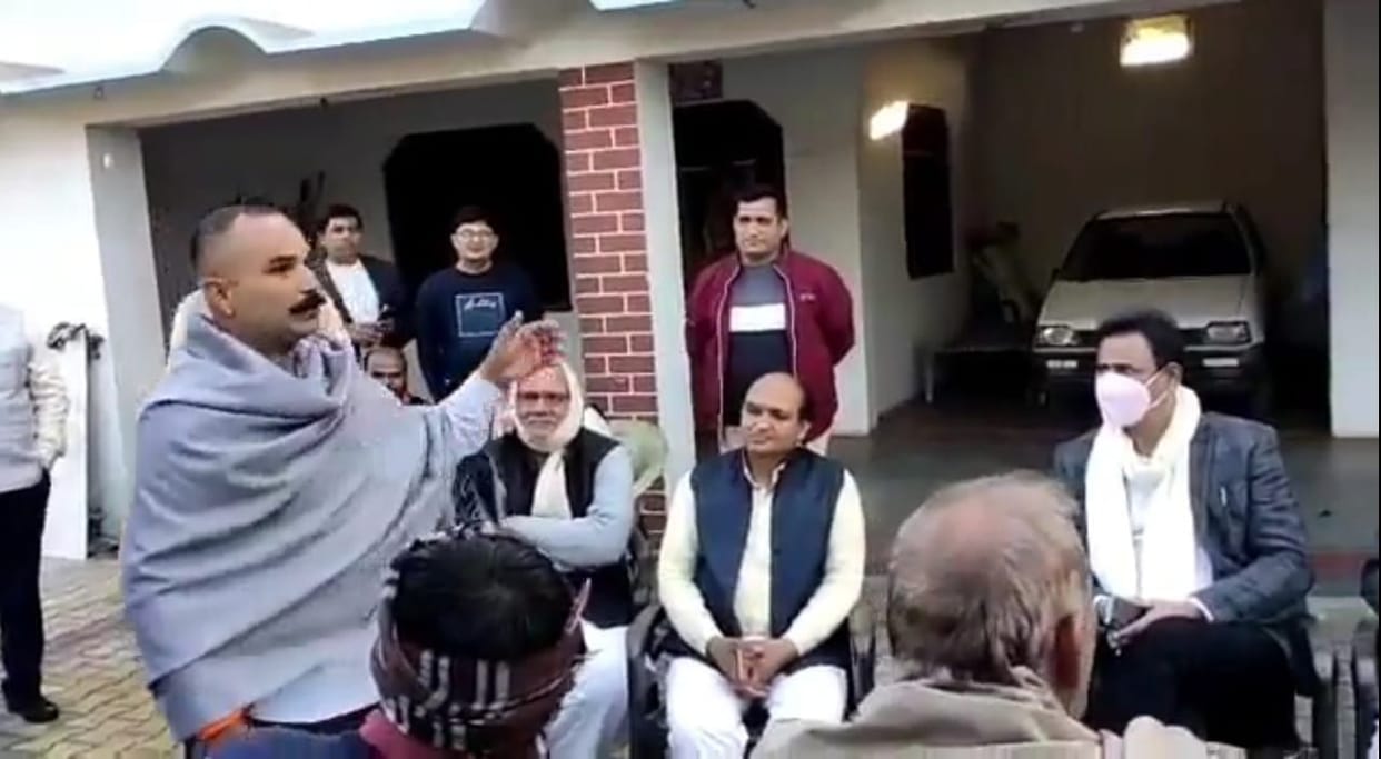 Devendra Nagpal surrounded by questions of Jat youth regarding his remarks