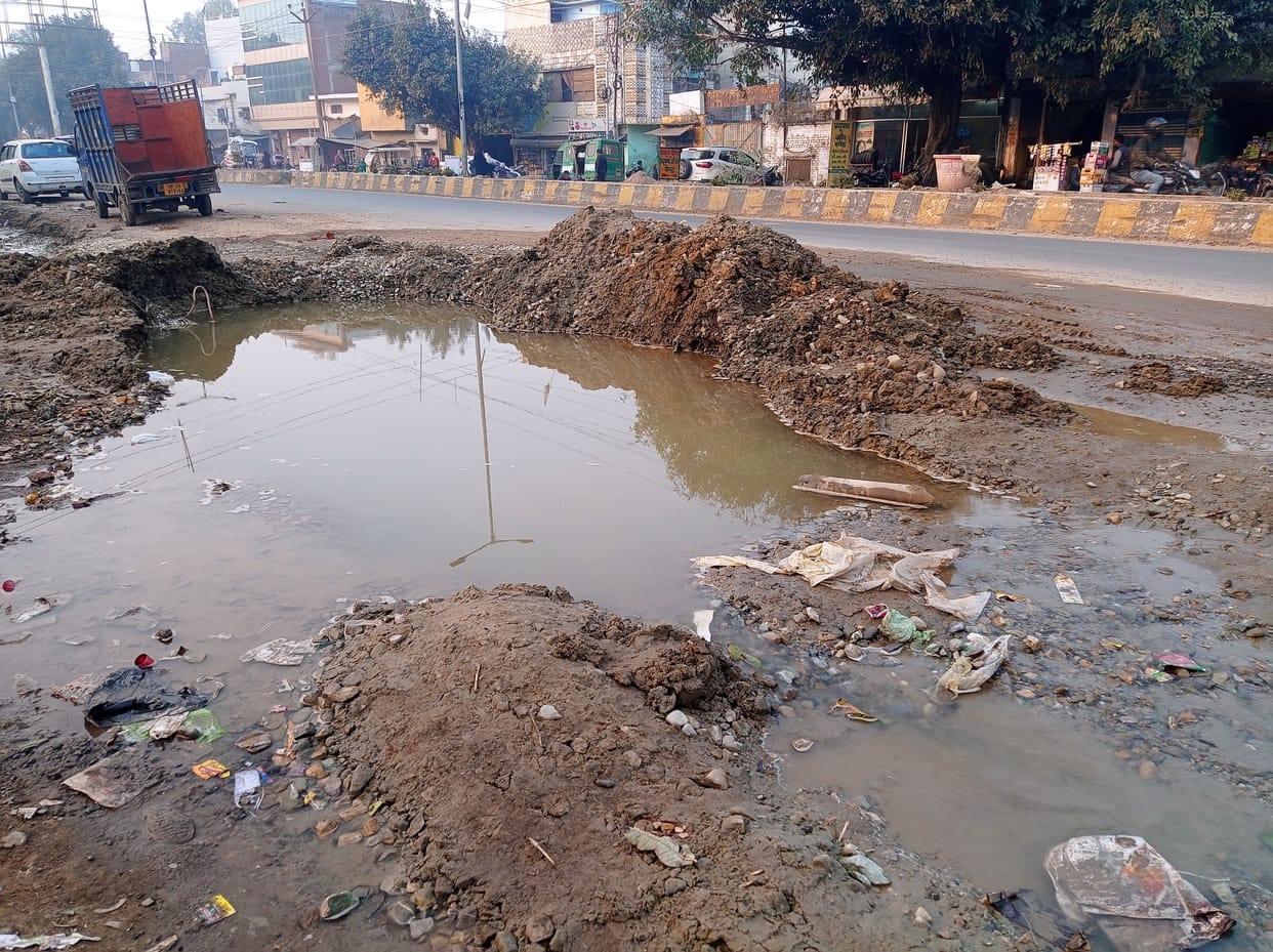Broken sewer line in Shyamganj during road widening