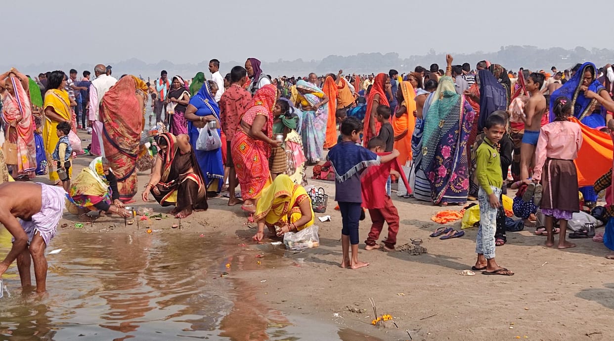 Devotees take a dip in the Ganges on Mauni Amavasya