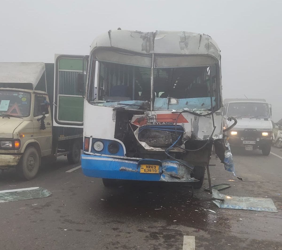 Bus and truck full of passengers collide, 12 injured