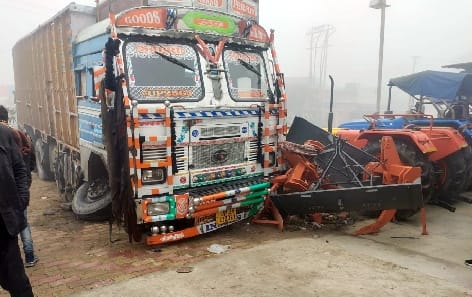 Tractor-trolley loaded with sugarcane collided with car in dense fog