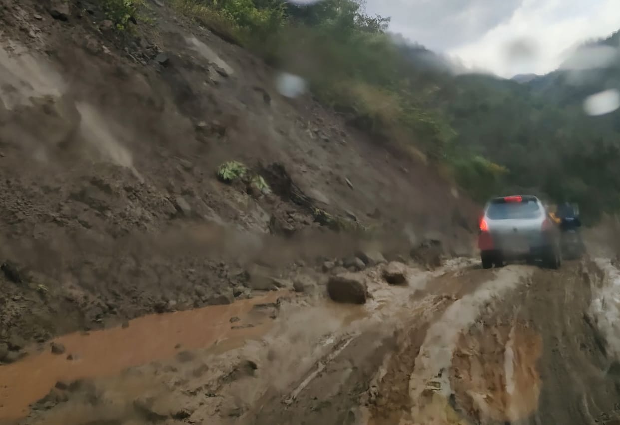 Vehicles slipping in the debris on the highway between Kotdwar-Dugadda