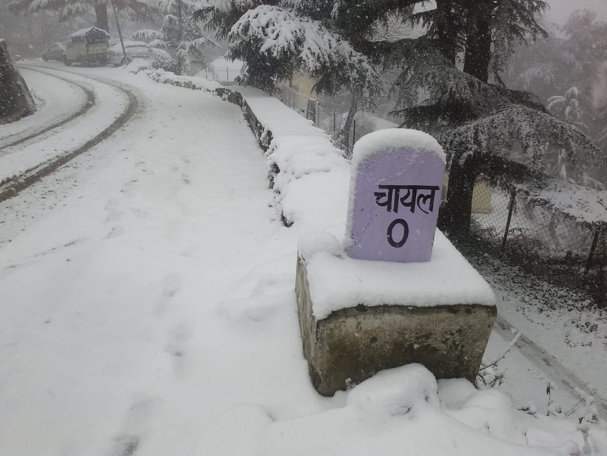 Snowfall at high hills Chail and Karol peak flakes welcome tousirts at Kasauli for first time