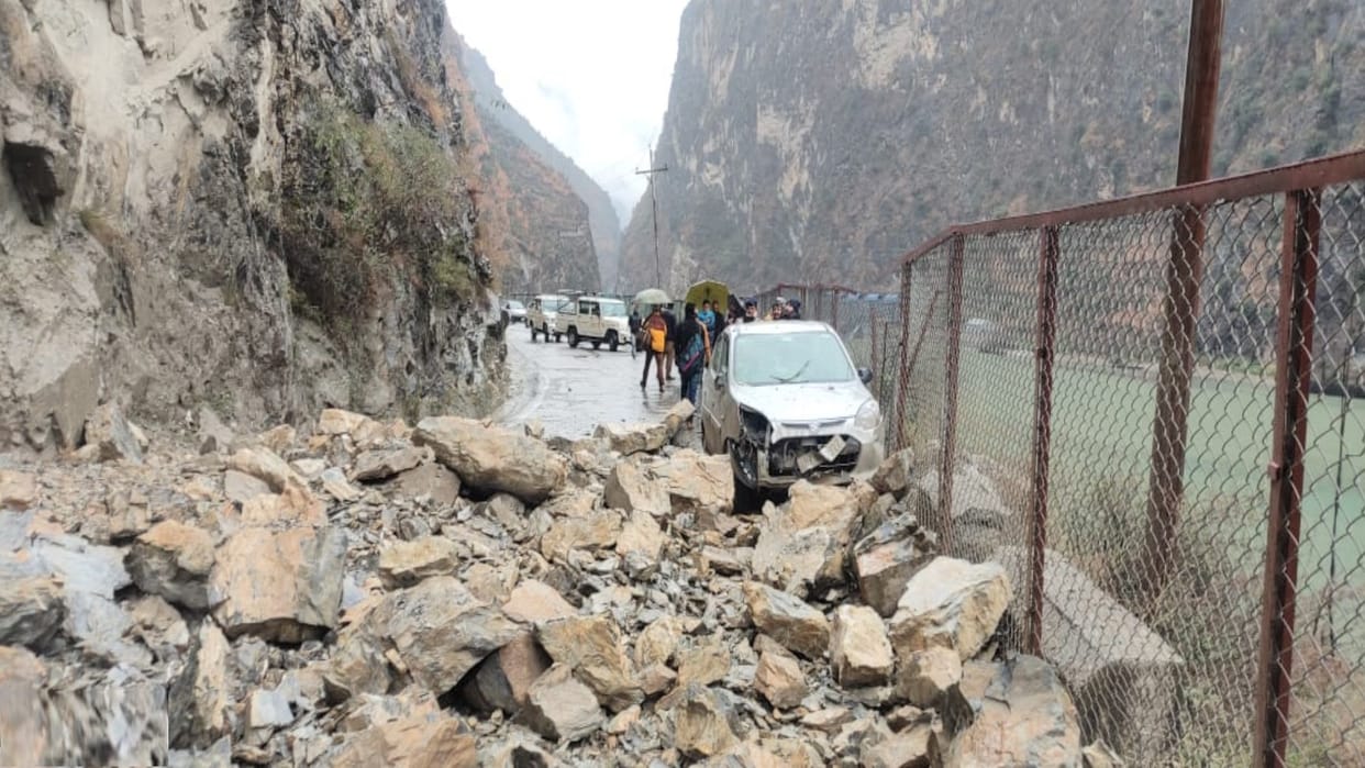 The highway remained closed for two hours due to the fall of boulders from hill, stones fell on the car