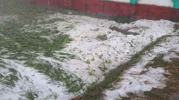 white sheet covered with hail