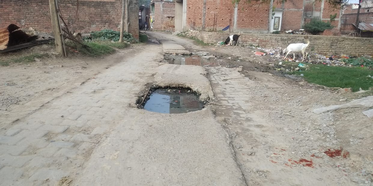 Slippery increased after rain, giving feast to open main hole accident