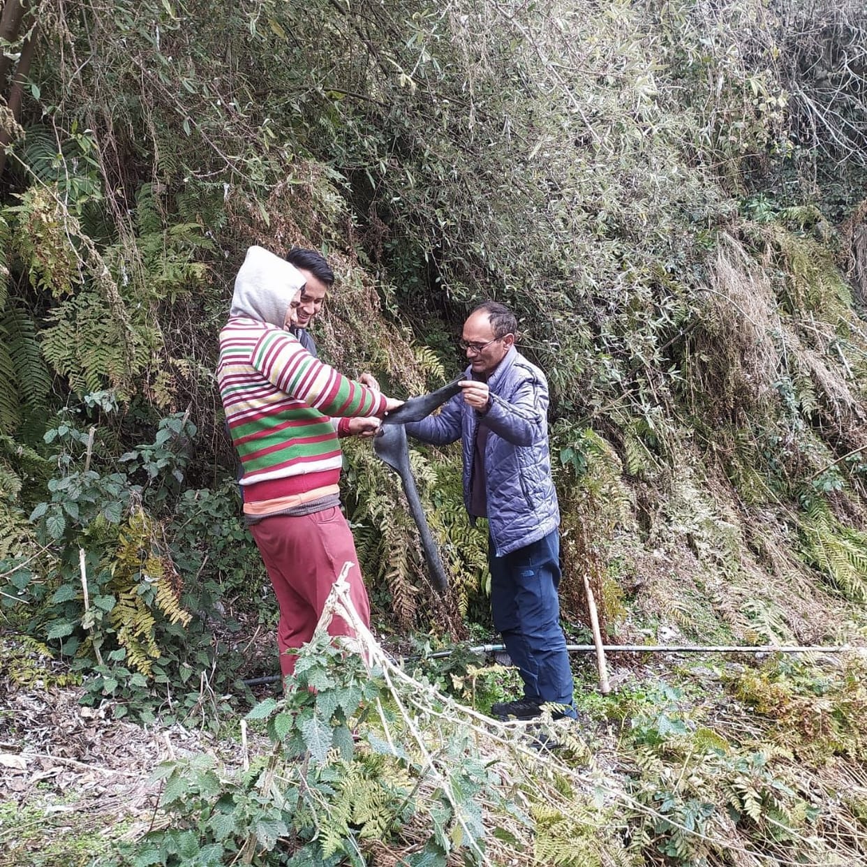People repair of drinking water line
