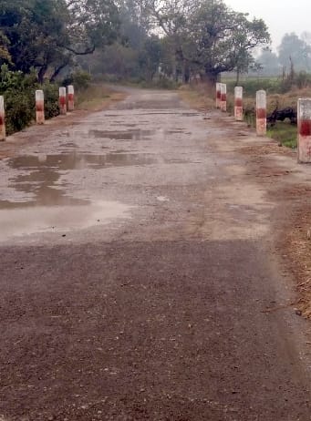 Give written assurance to build a high bridge over river Tahka and take votes