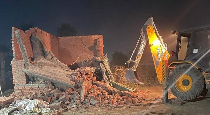 Bulldozer run on illegal construction