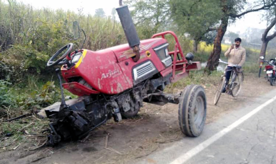Tractor trolley and car collide head-on