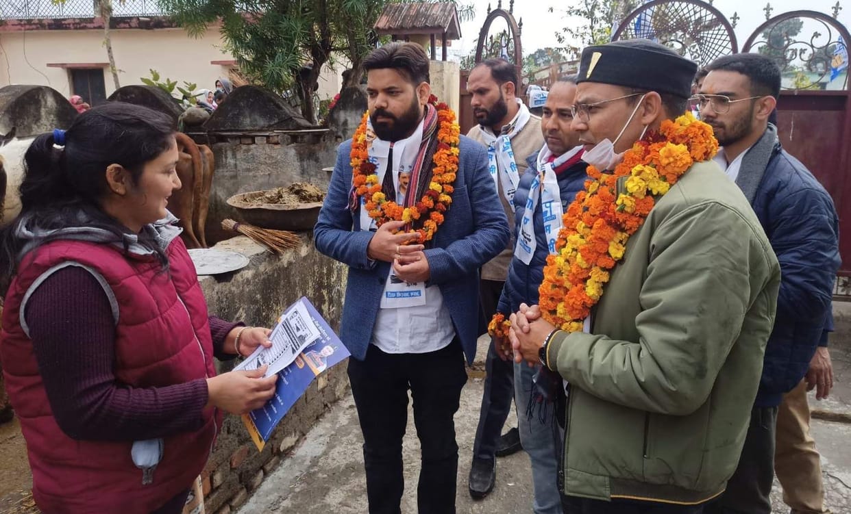 Dr. Raje Singh Negi went door to door asking for votes