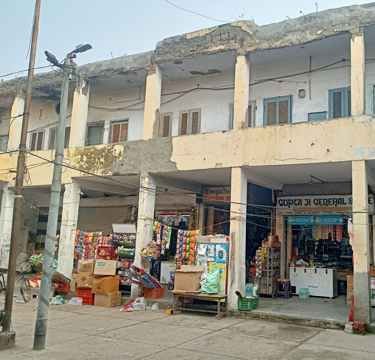 Shabby shopping complex inviting accident, shopkeeper in panic