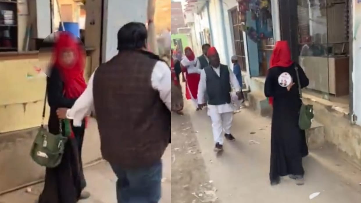 SP worker paste a sticker on back of girl wearing burqa, video went viral.