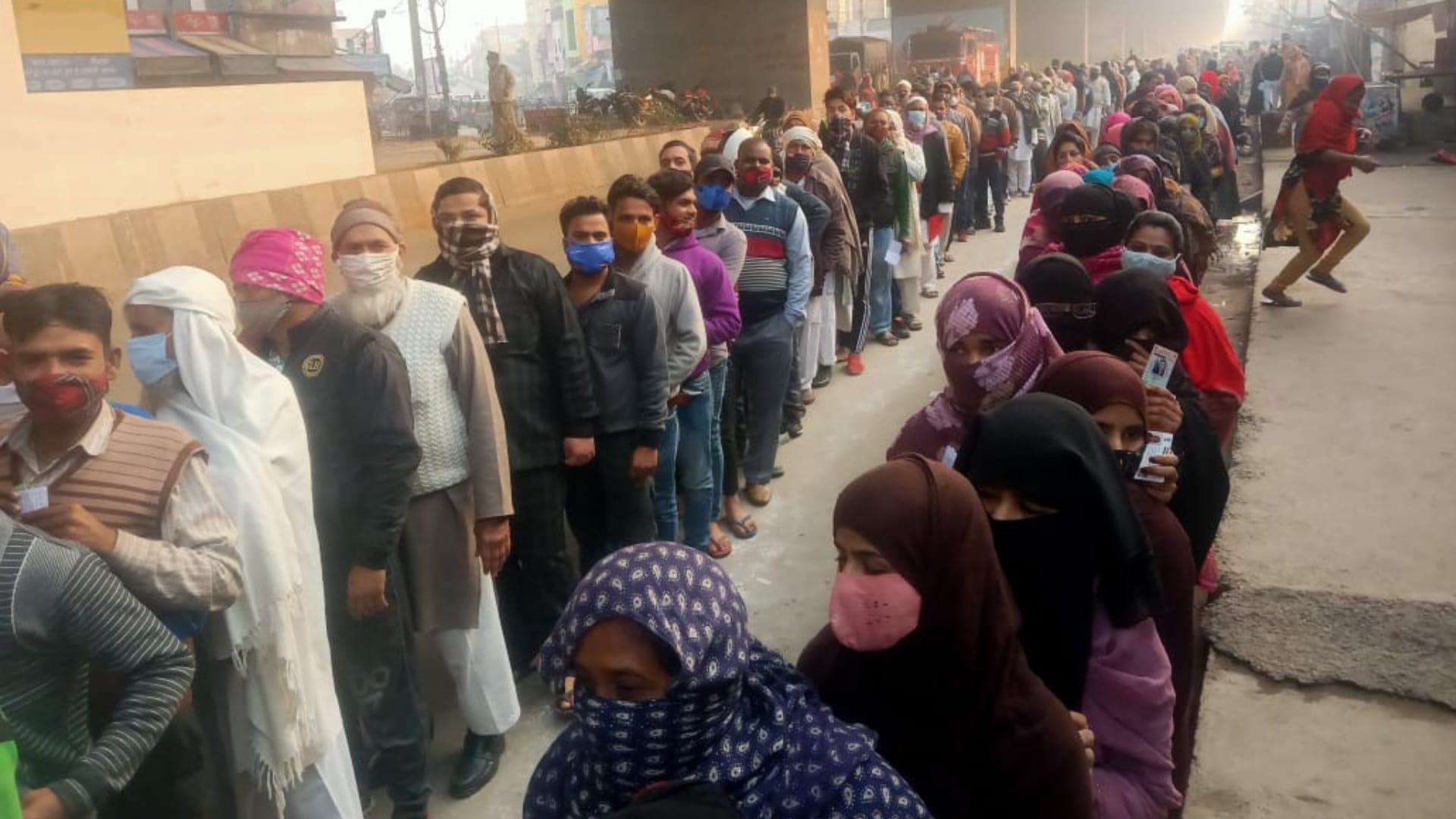 UP Election 2022 long queues excited voters outside polling booths see photos of 11 districts
