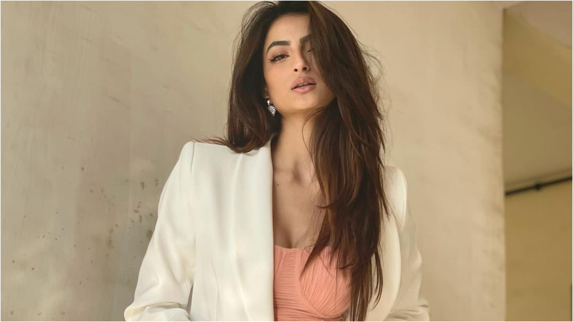 palak tiwari latest photoshoot in peach ruched dress with beautiful earrings