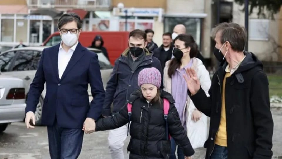 Girl with down syndrome gets bullied North Macedonia President Stevo Pendarovski walks her to school