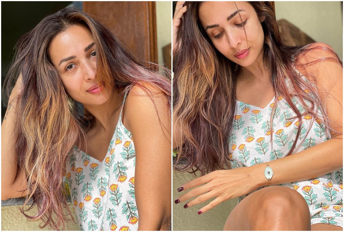 malaika arora steps out in pastel shade long maxi dress with blue cap