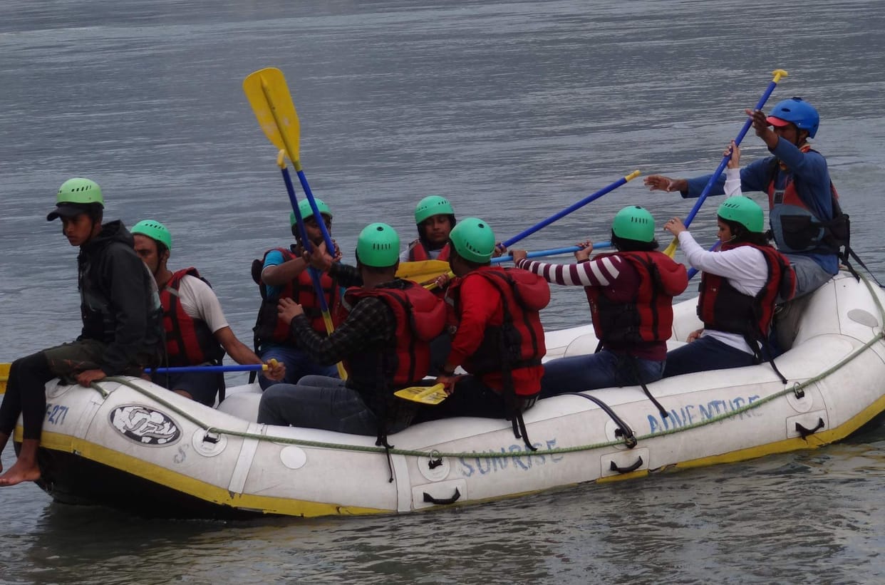 Tourists enjoy rafting