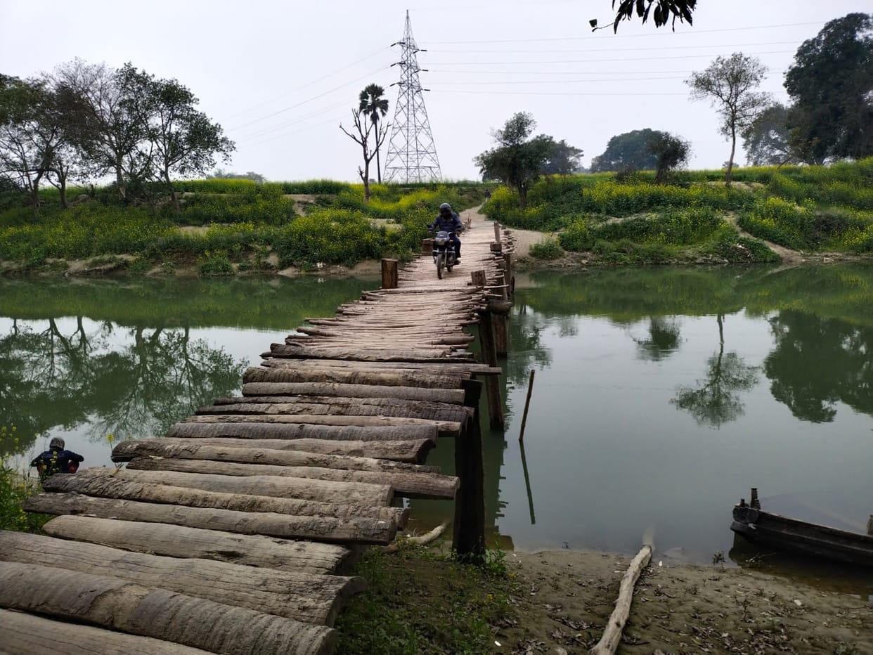 Pucca bridge not built, people passing by taking risk