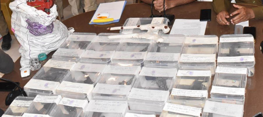 24 firearms recovered in illegal factory, four arrested