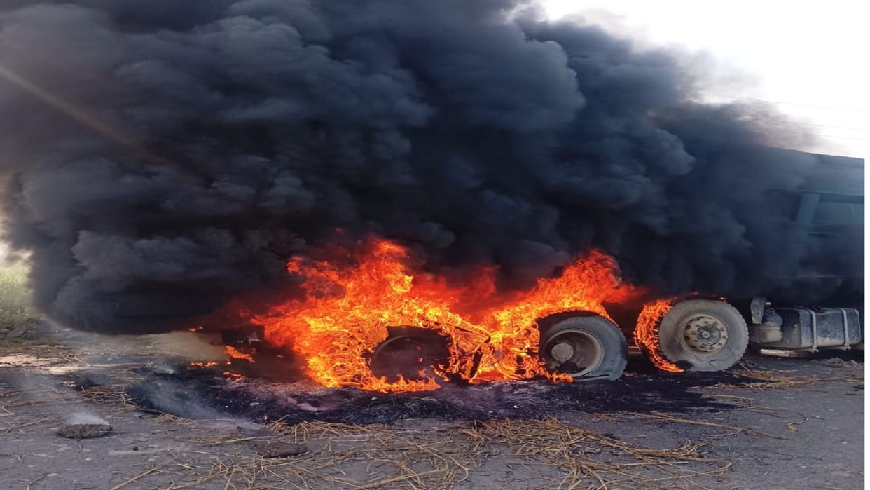 Youth dies after being crushed by dumper angry people set vehicle on fire dead body sent for post-mortem