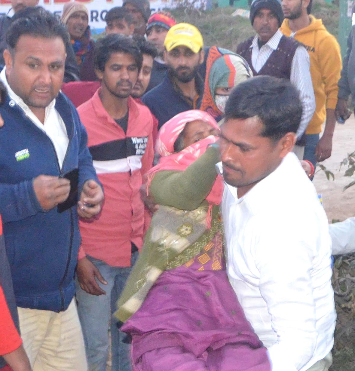 Three scooty riders injured in truck collision, woman dragged far