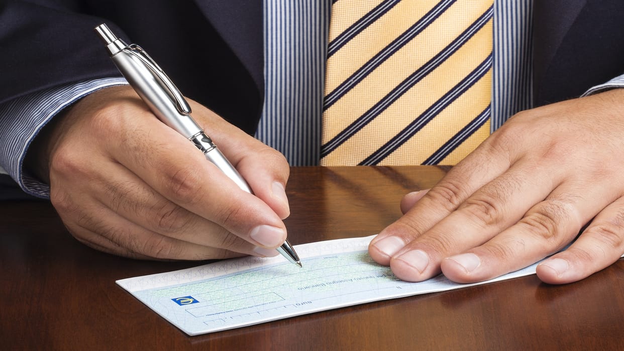 Bank Rules Why Do We Sign On The Back Of The Cheque Know The Rules Here