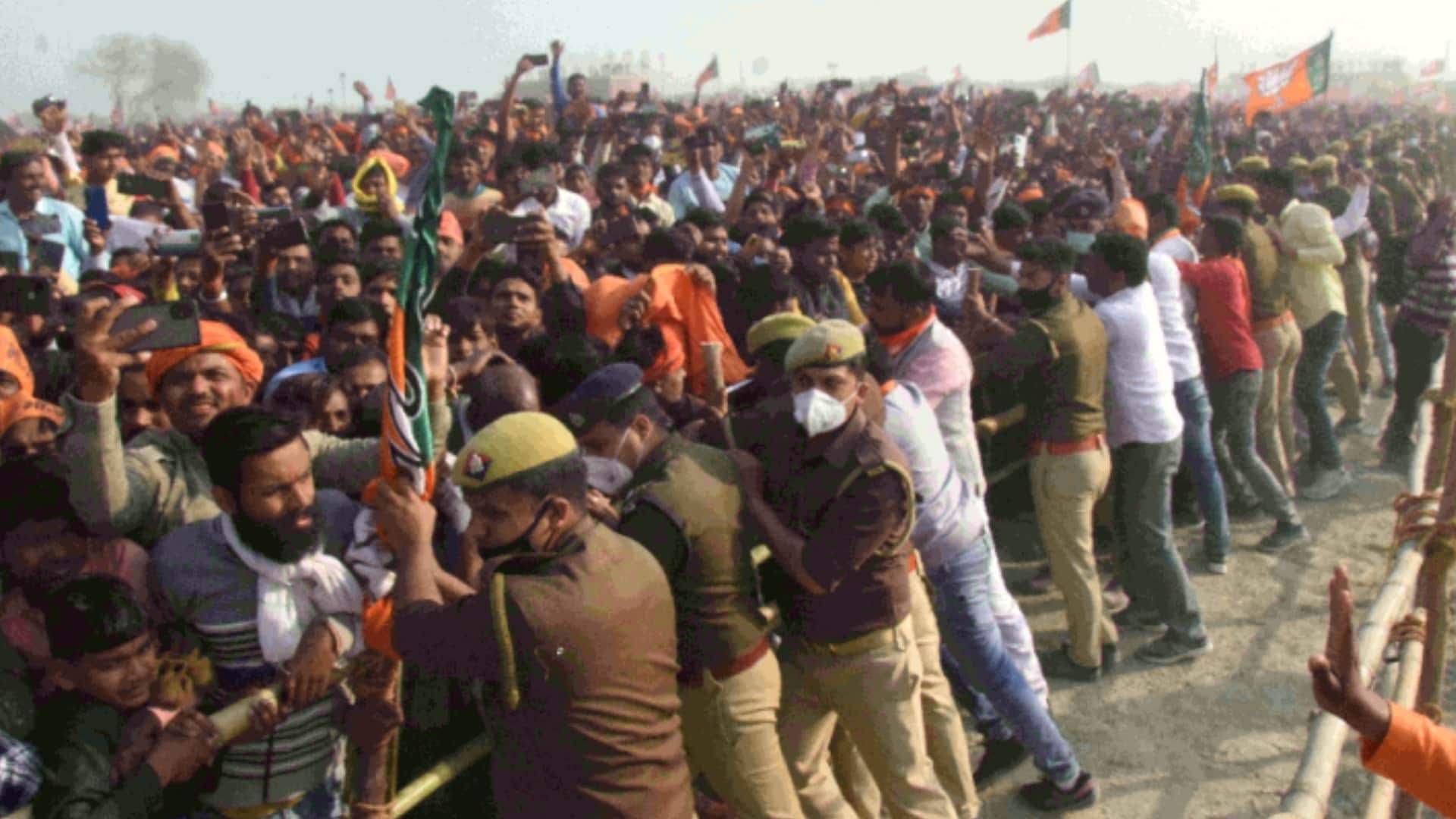 UP Election 2022 PM modi in Unnao rally touches feet of district president of BJP know the reason video goes viral