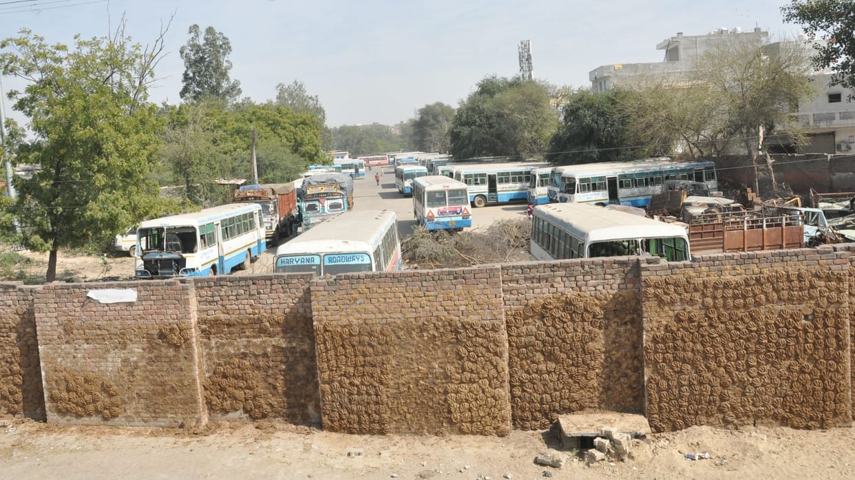 The gate will break the back wall of the bus stand, buses will come out from the road of the workshop
