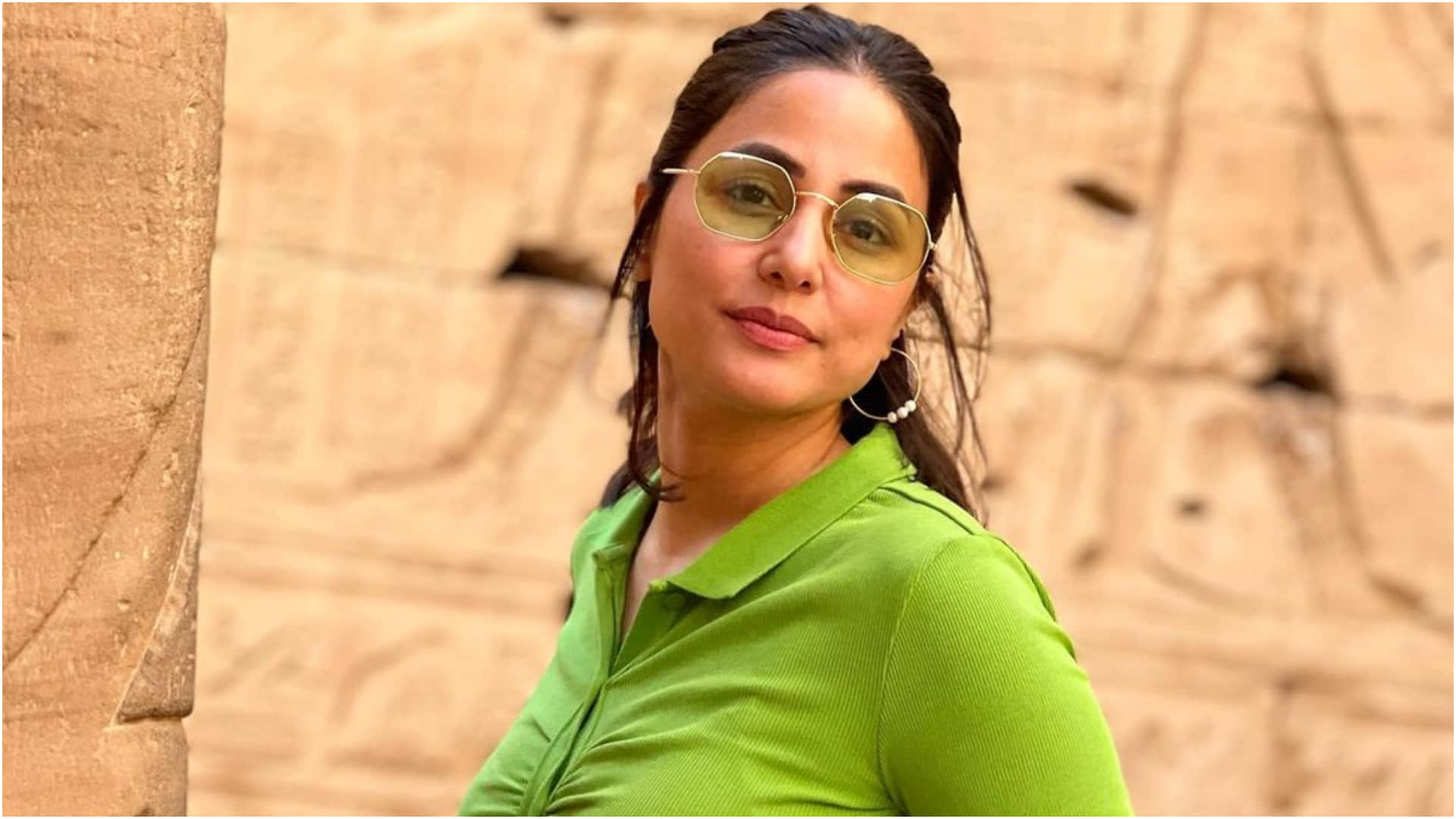 hina khan egypt holiday look stylish with thigh high slit denim skirt and green top