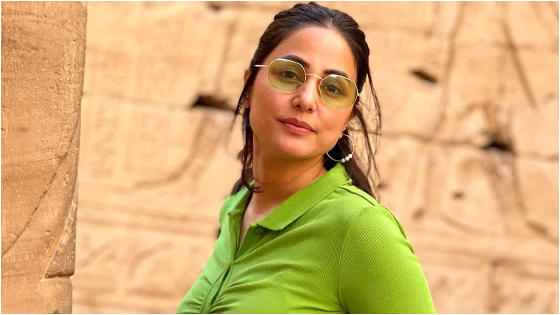 hina khan egypt holiday look stylish with thigh high slit denim skirt and green top