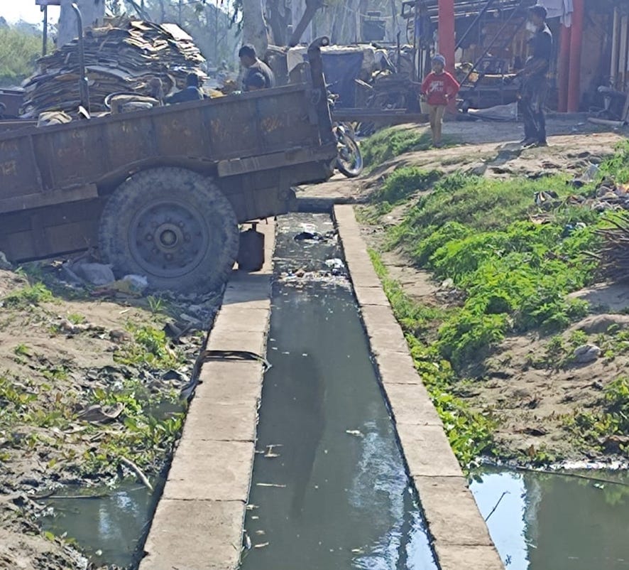 Drain overflows, water flowing on the road