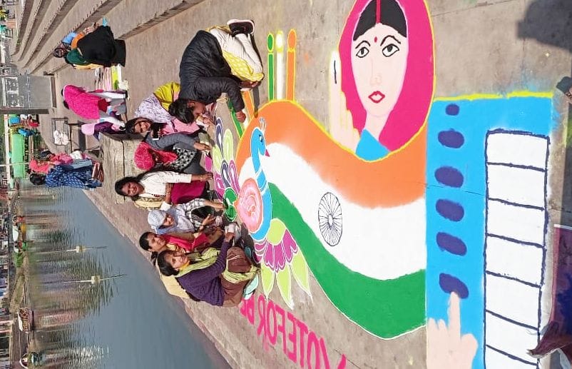 made rangoli made aware for voting