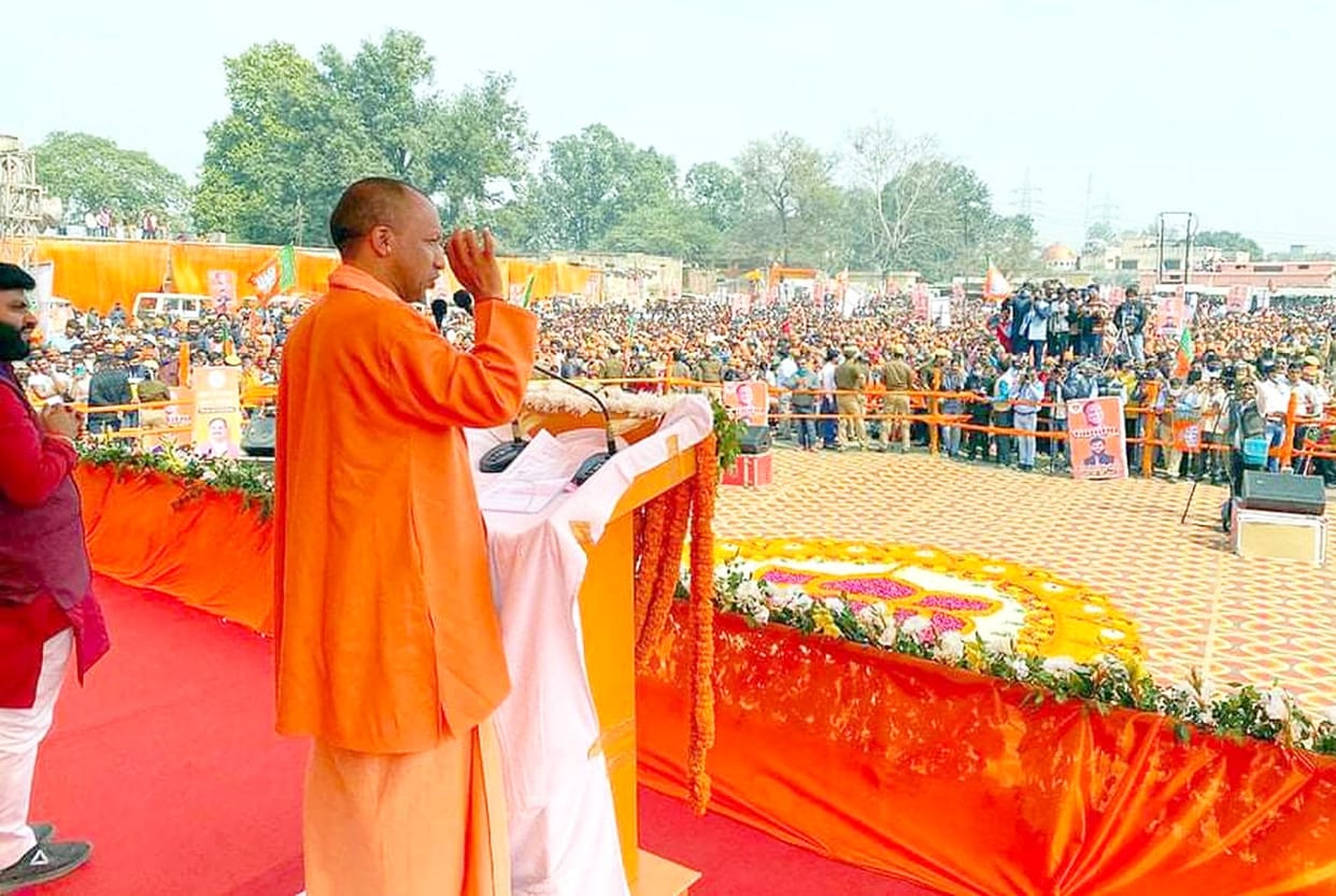Development stick in one hand Bulldozer in the other - Yogi Adityanath