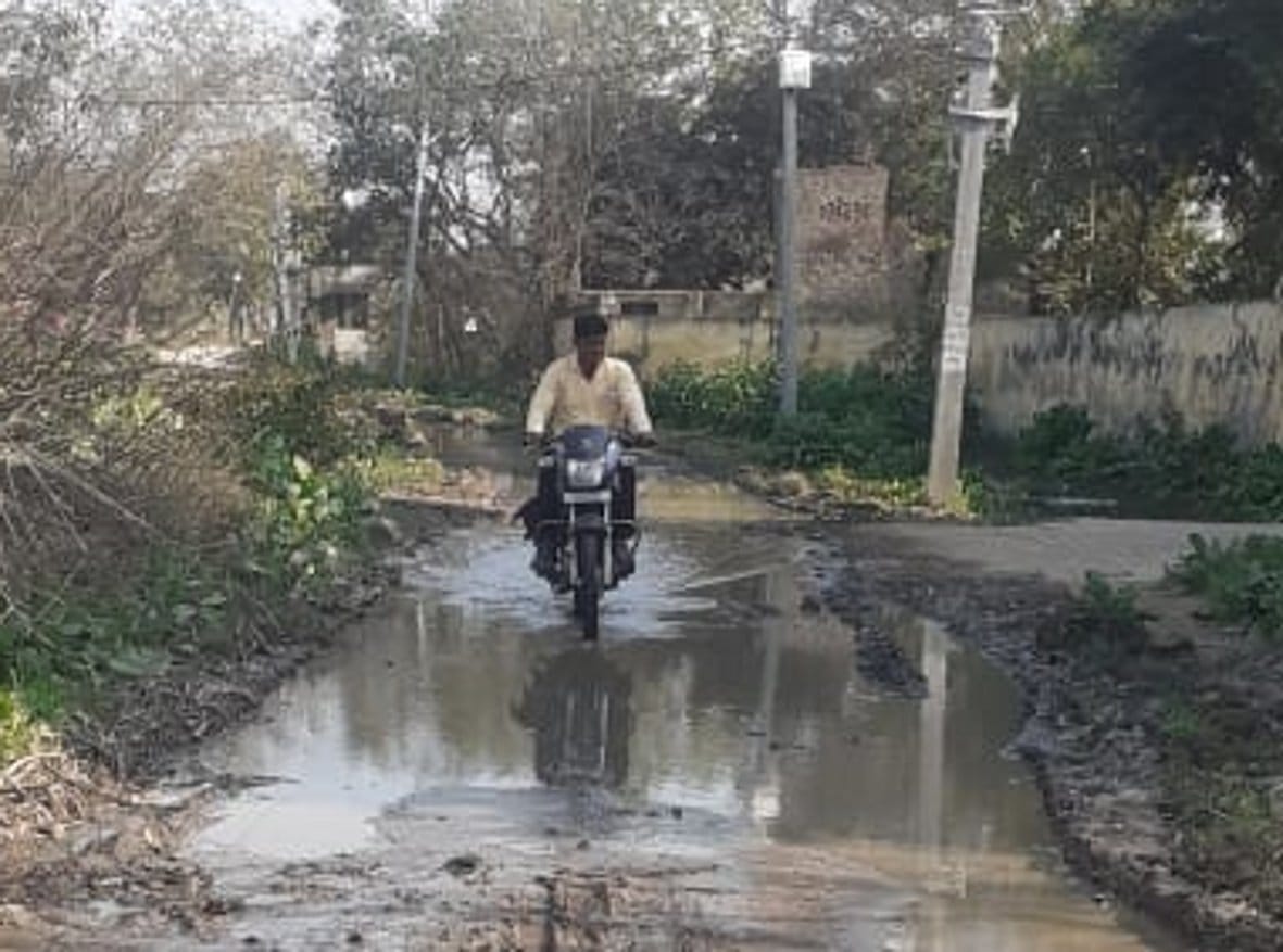 People upset due to waterlogging on the main road of Dhanaura Tikri village