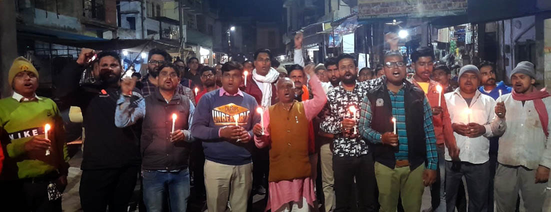 Candle march in protest against the killing of Bajrang Dal worker